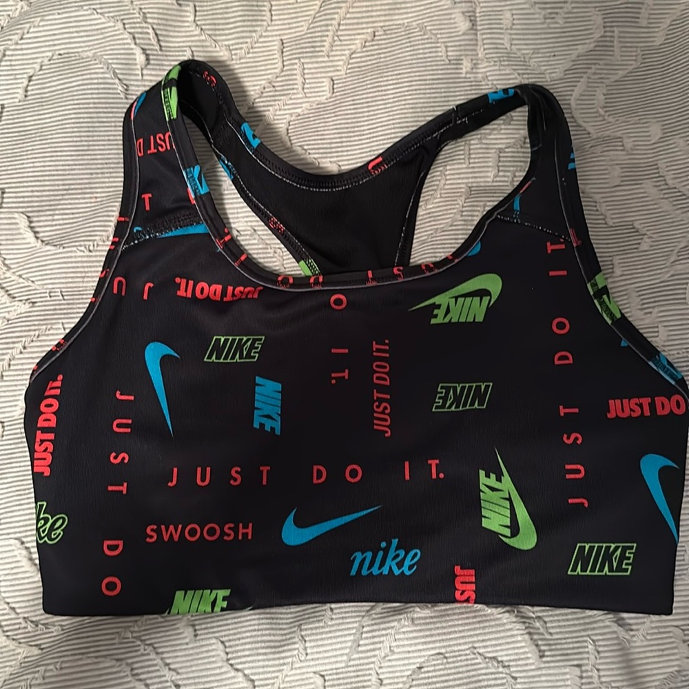 Nike black and colorful sports bra. Size small.